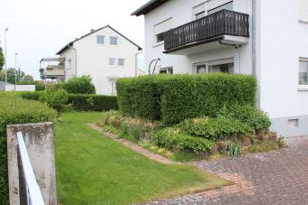 Gepflegtes 2-Familienhaus mit Garten - Bild# 10