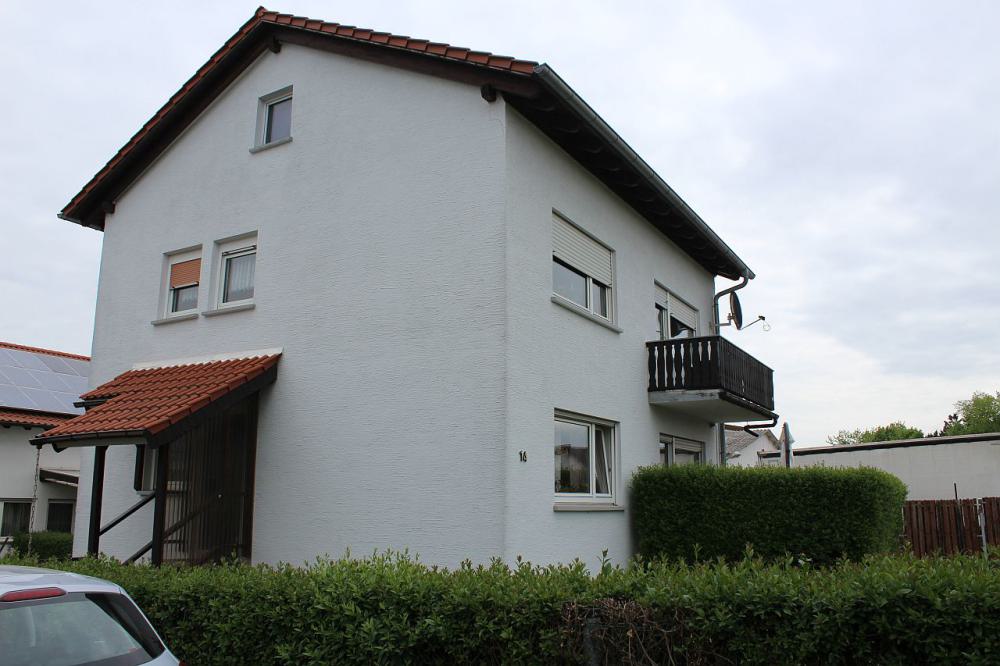 Gepflegtes 2-Familienhaus mit Garten - Bild# 2
