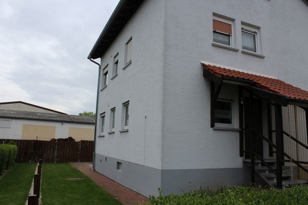 Gepflegtes 2-Familienhaus mit Garten - Bild# 5